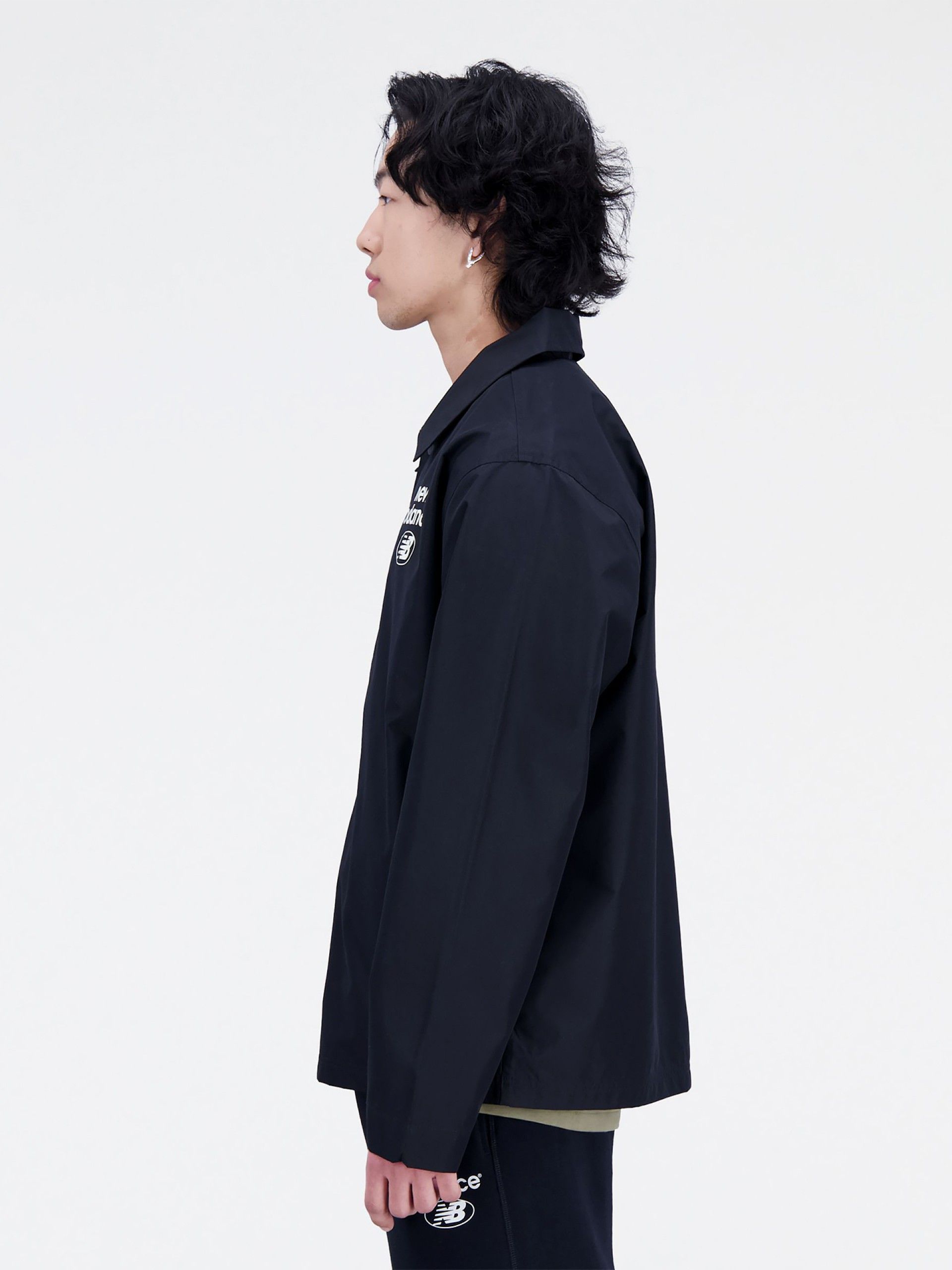 Casaco New Balance Essentials Reimagined Woven