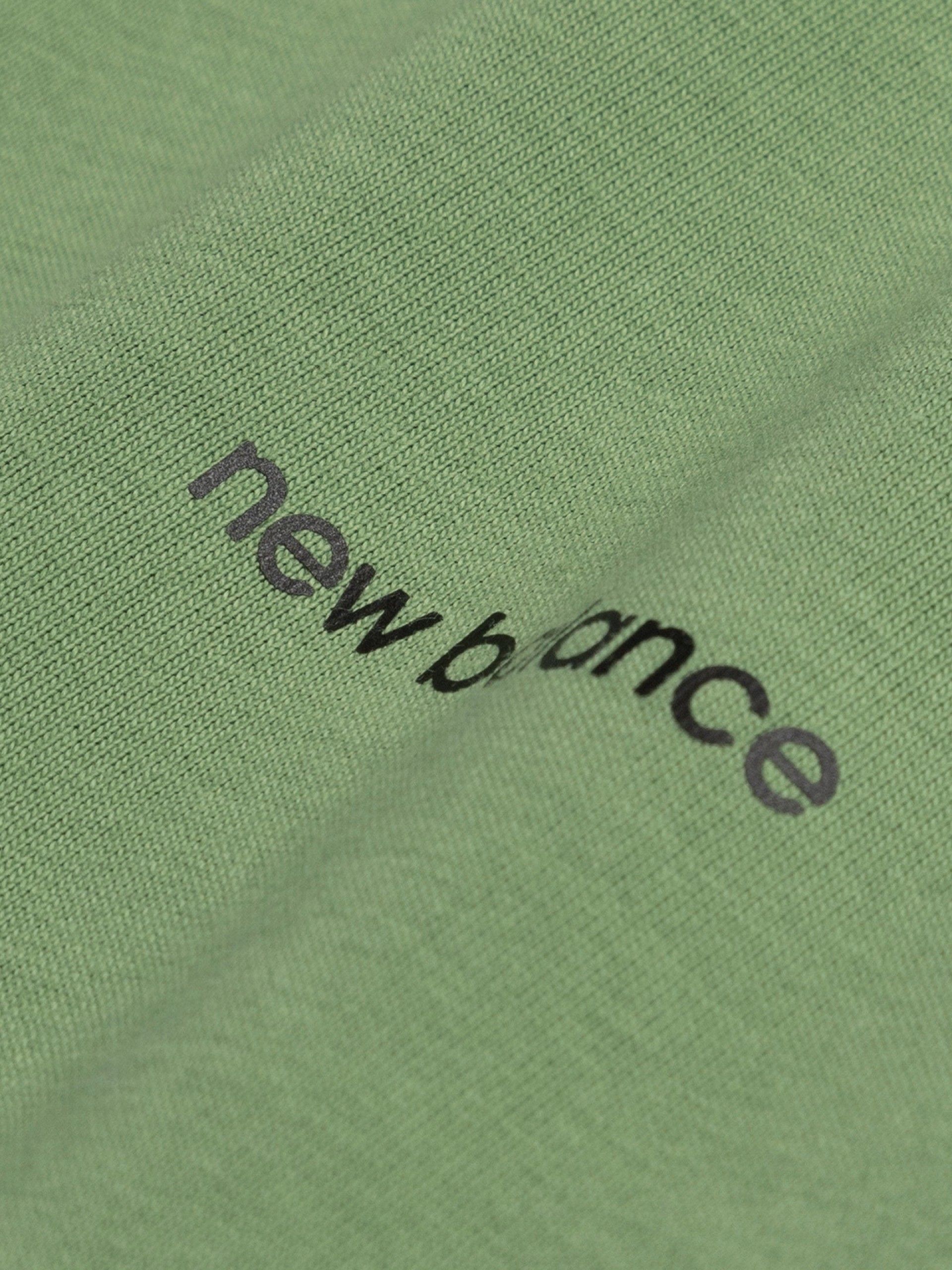 T-shirt New Balance Essentials Café Shop Front