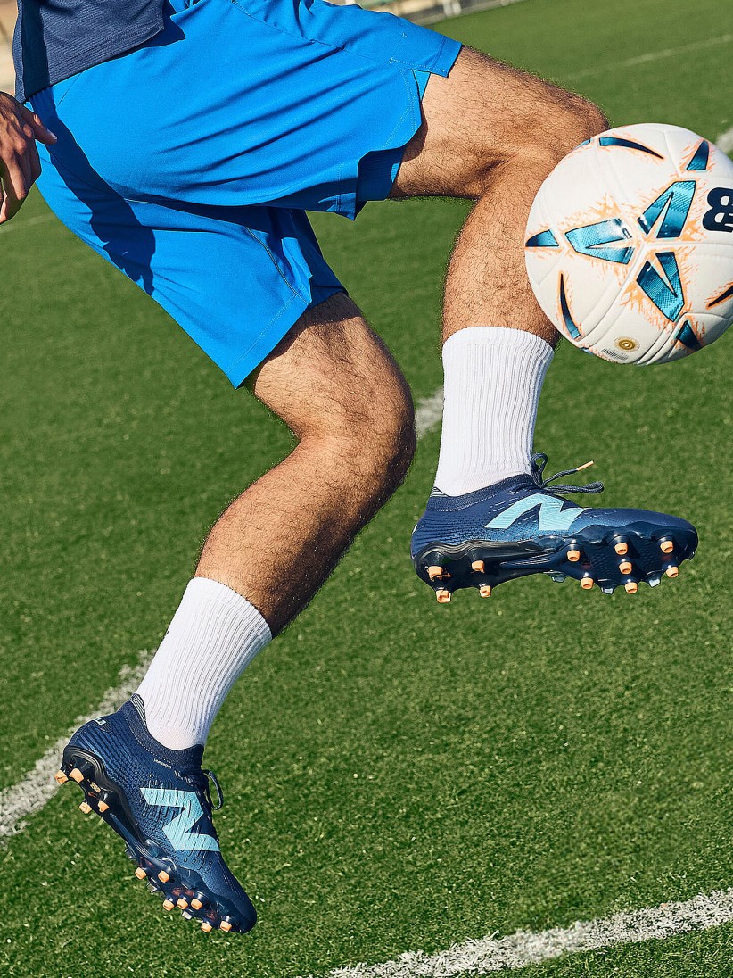 New Balance Tekela Pro Low V4+ FG Football Boots