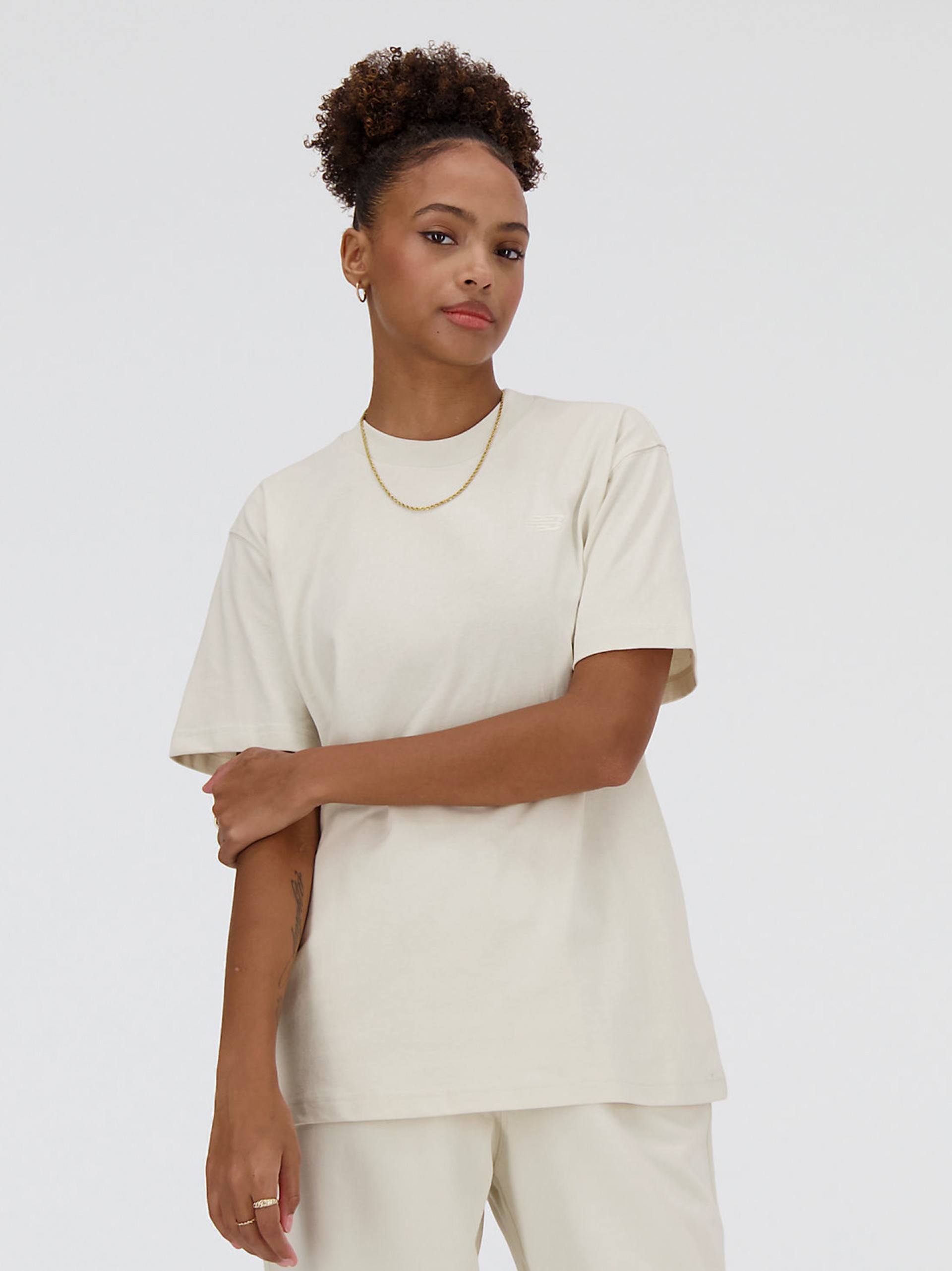 Camiseta New Balance Athletics Beige