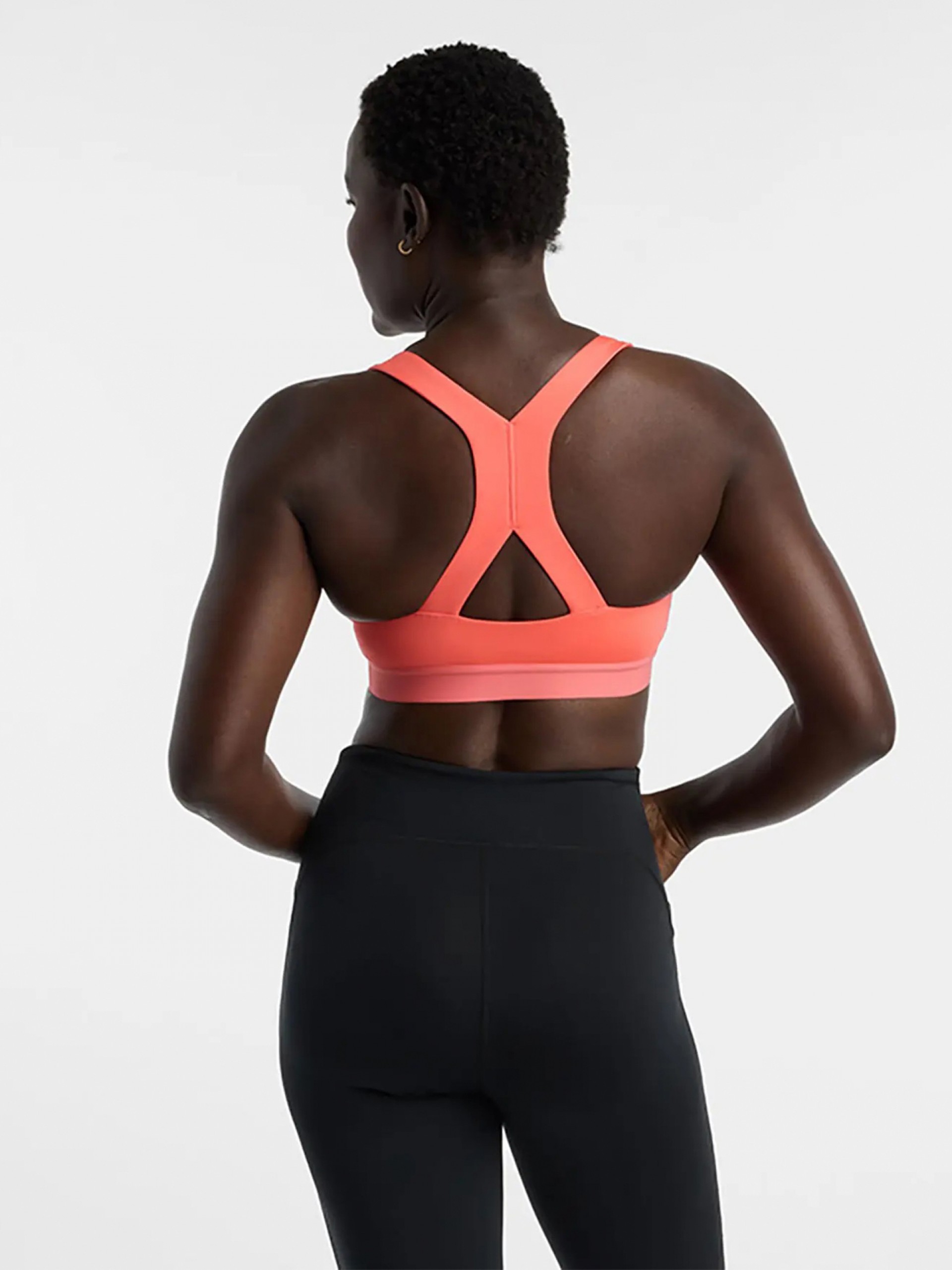 Sujetador Deportivo New Balance Essential Train Sujeción Media Salmón