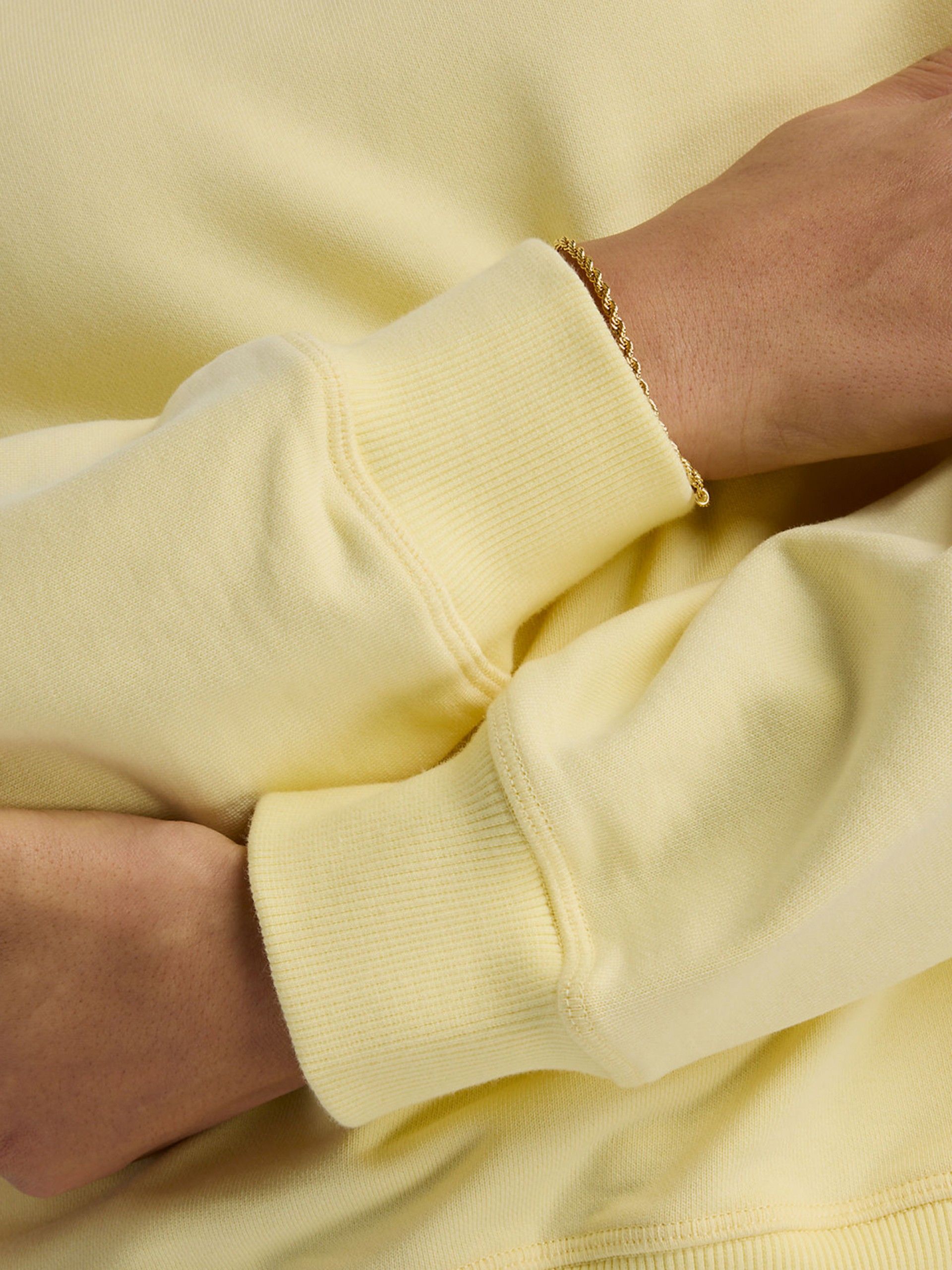 Sudadera New Balance Athletics French Terry Crew Amarilla