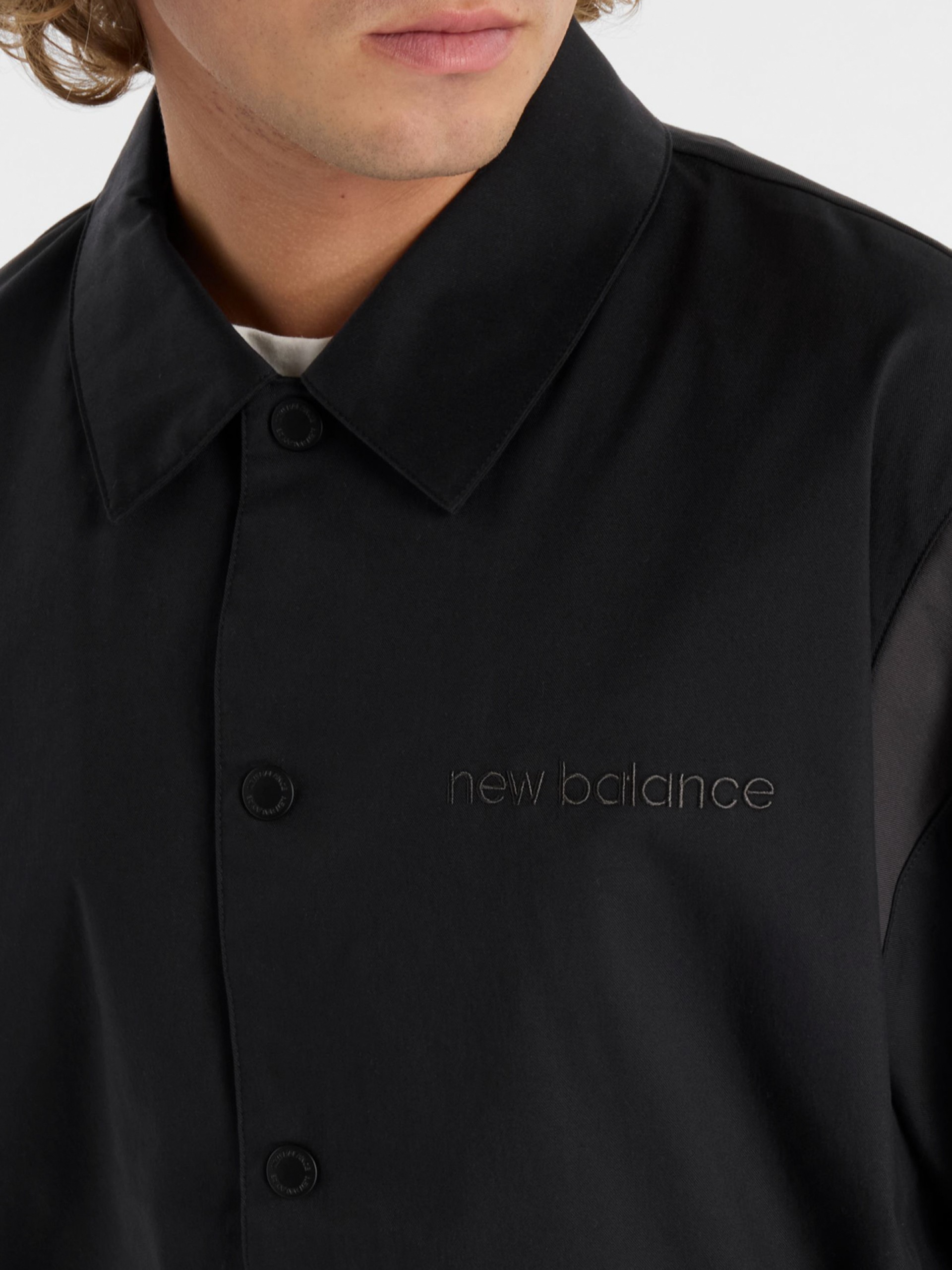 Chaqueta New Balance Athletics Varsity Negra