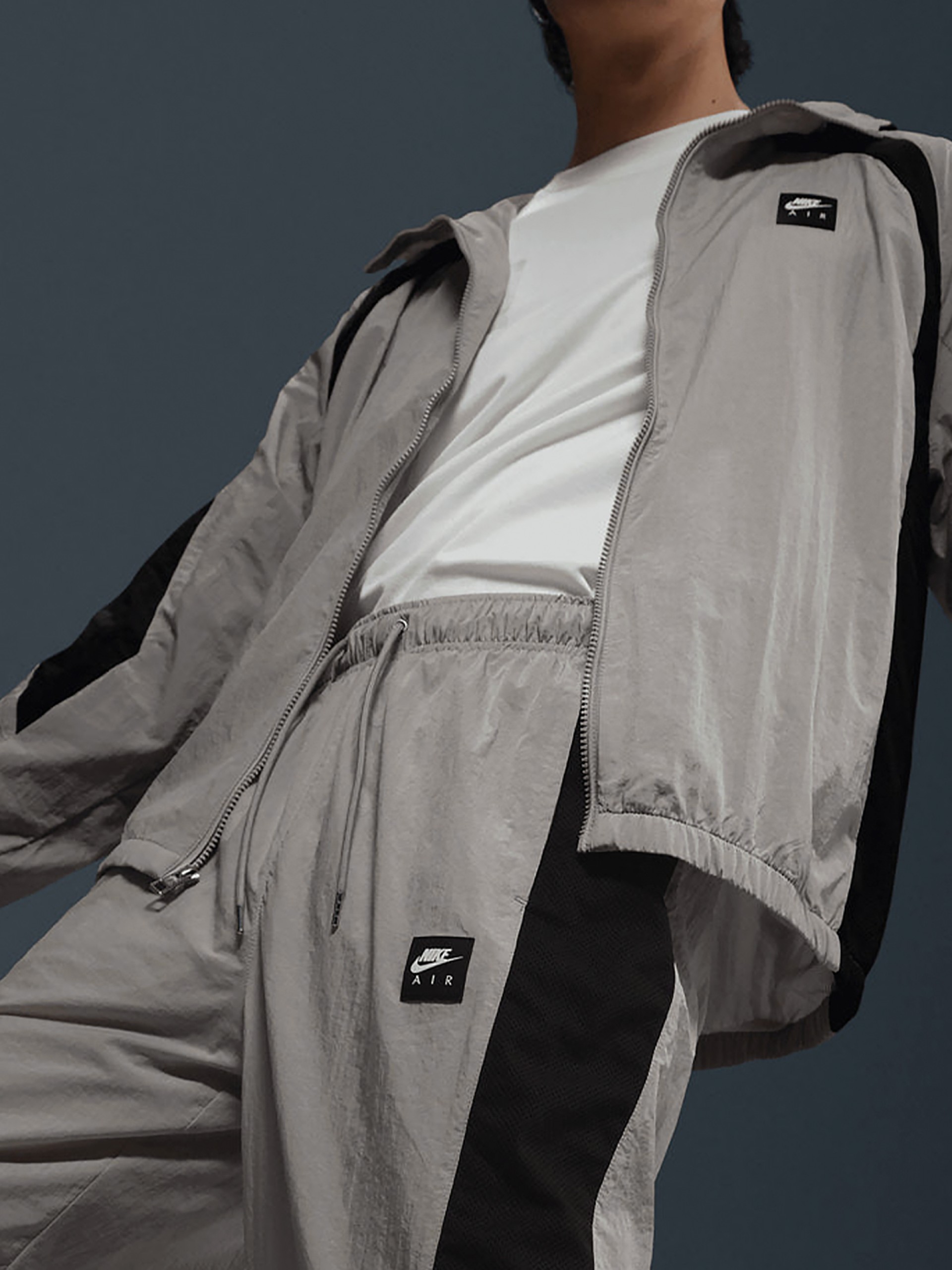 Pantalones Nike Air Woven Grises y Negros Para Hombre