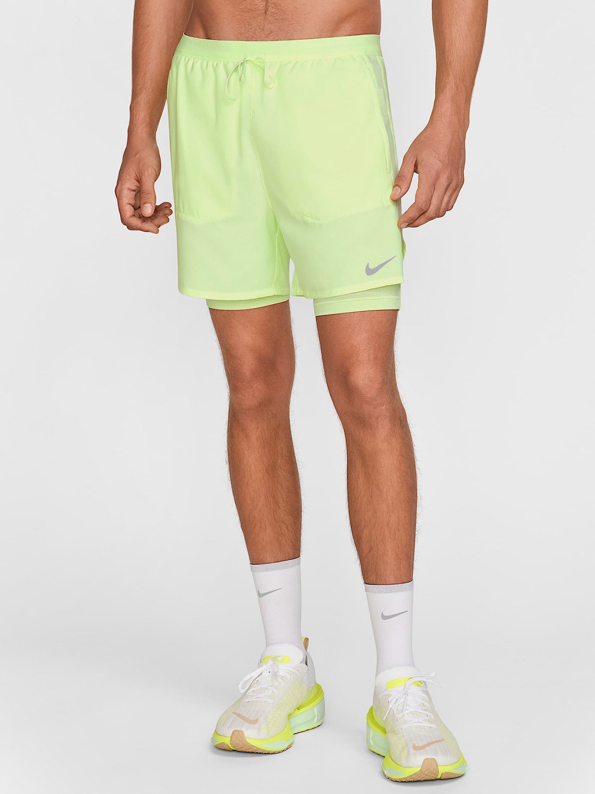 Calções de Running Nike Dri-FIT Stride Hybrid 13cm Verdes Para Homem