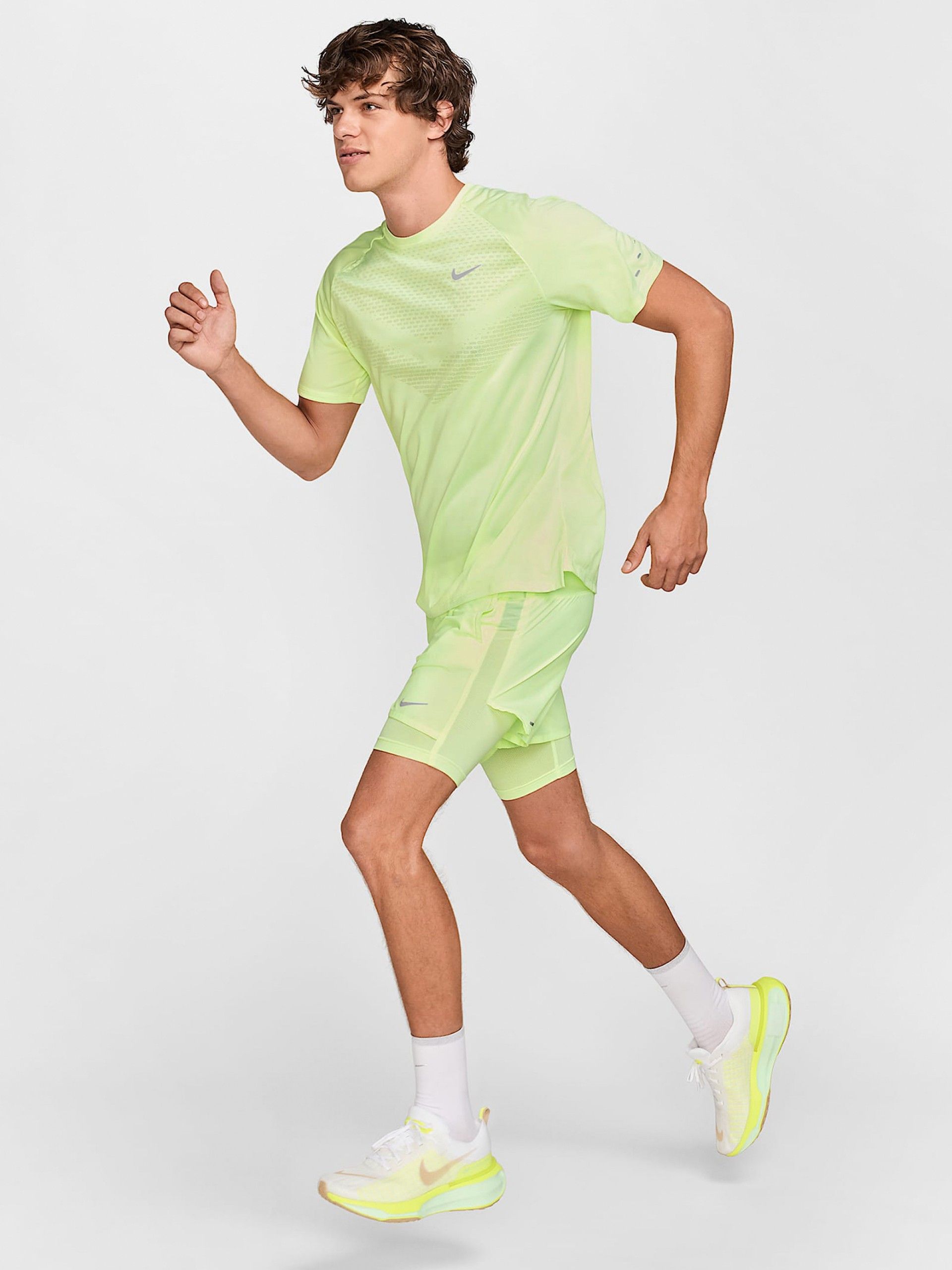 Calções de Running Nike Dri-FIT Stride Hybrid 13cm Verdes Para Homem