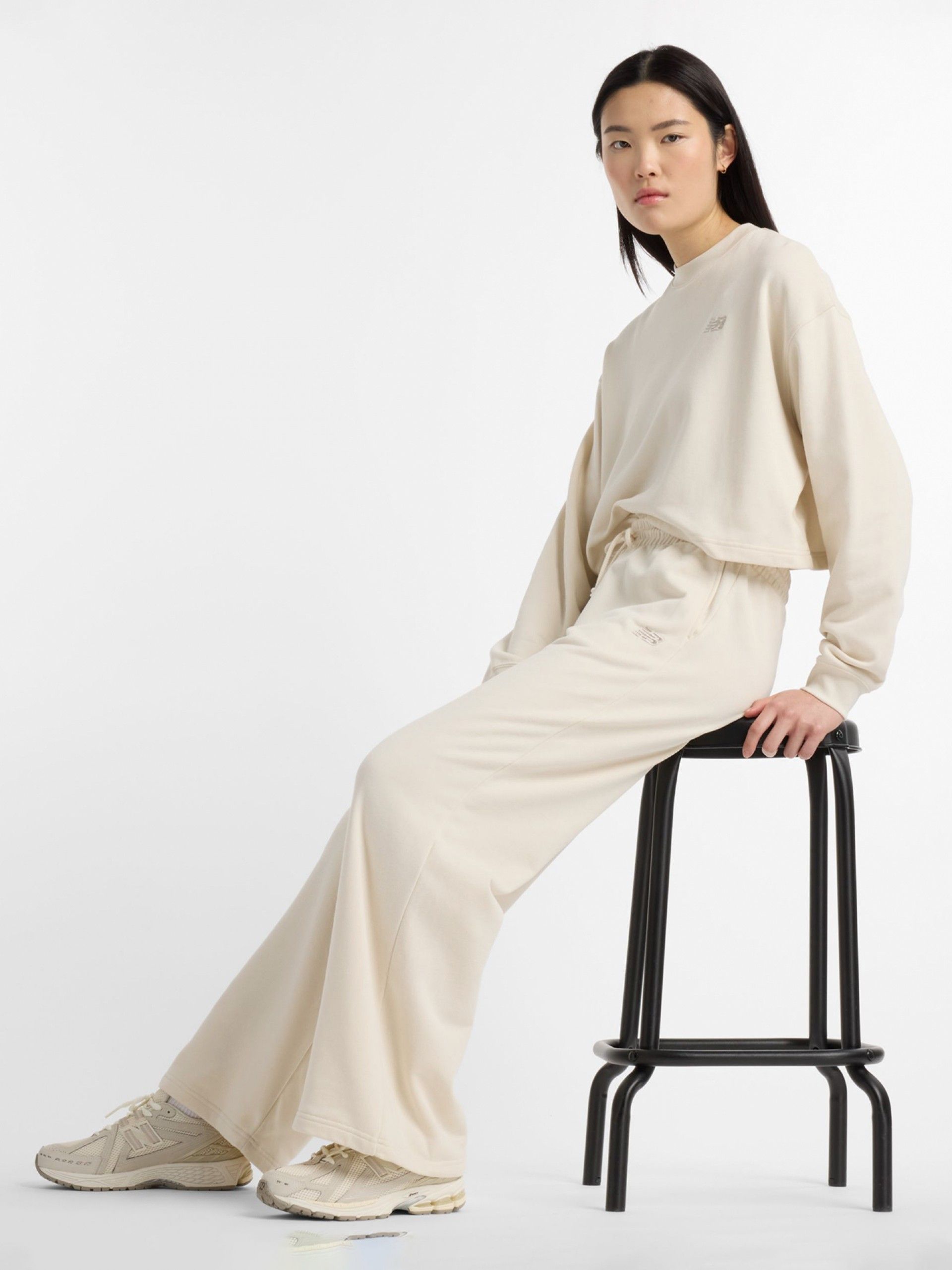 Pantalones New Balance Coastal Fleece Beige