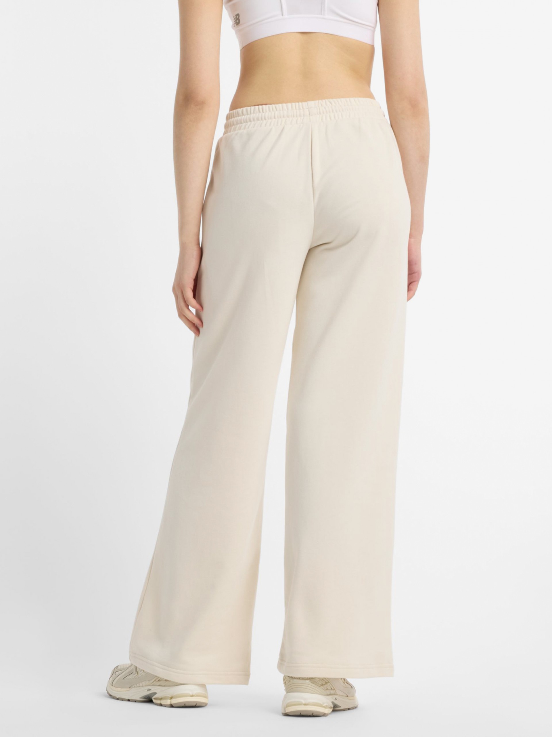 Pantalones New Balance Coastal Fleece Beige