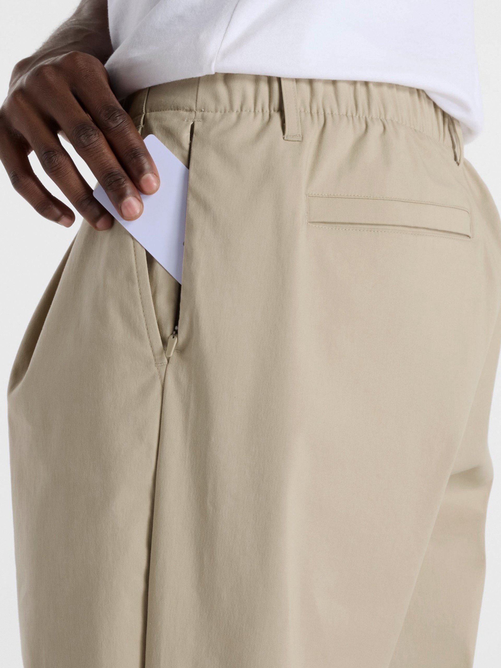 Calças New Balance Athletics Relaxed Bege