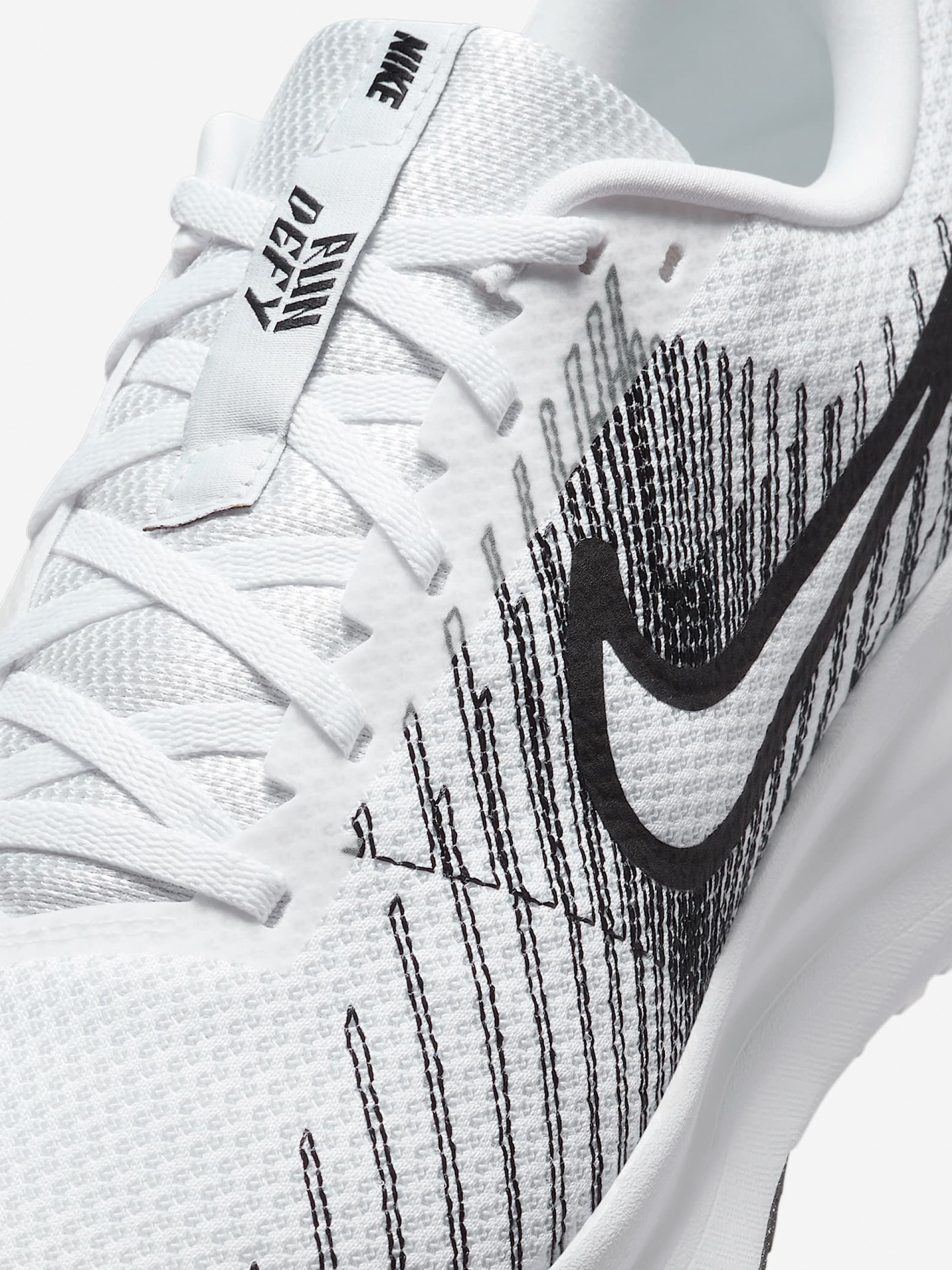 Zapatillas de Running Nike Run Defy Blancas y Negras Para Mujer