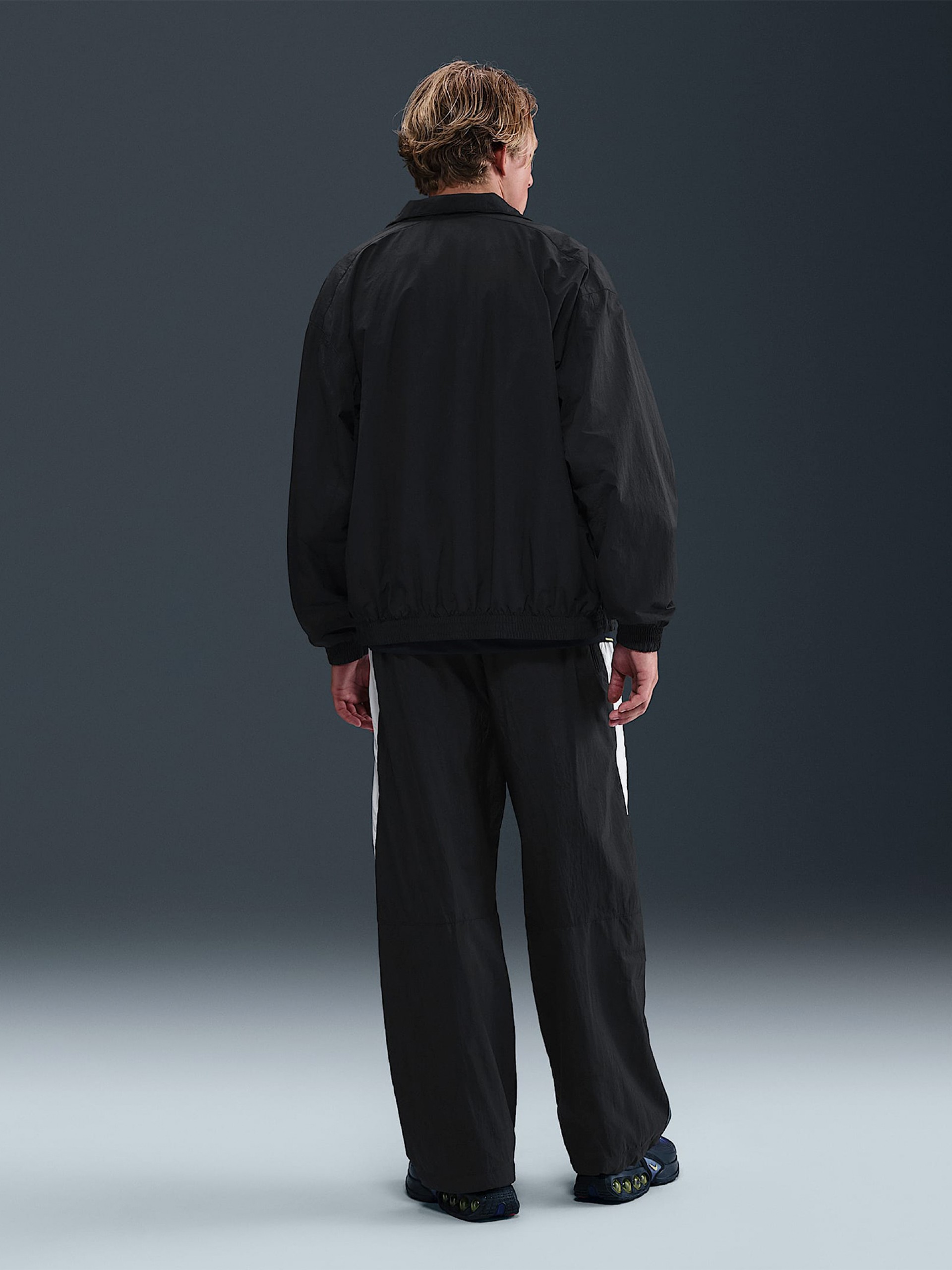 Pantalones Nike Air Woven Negros y Blancos Para Hombre