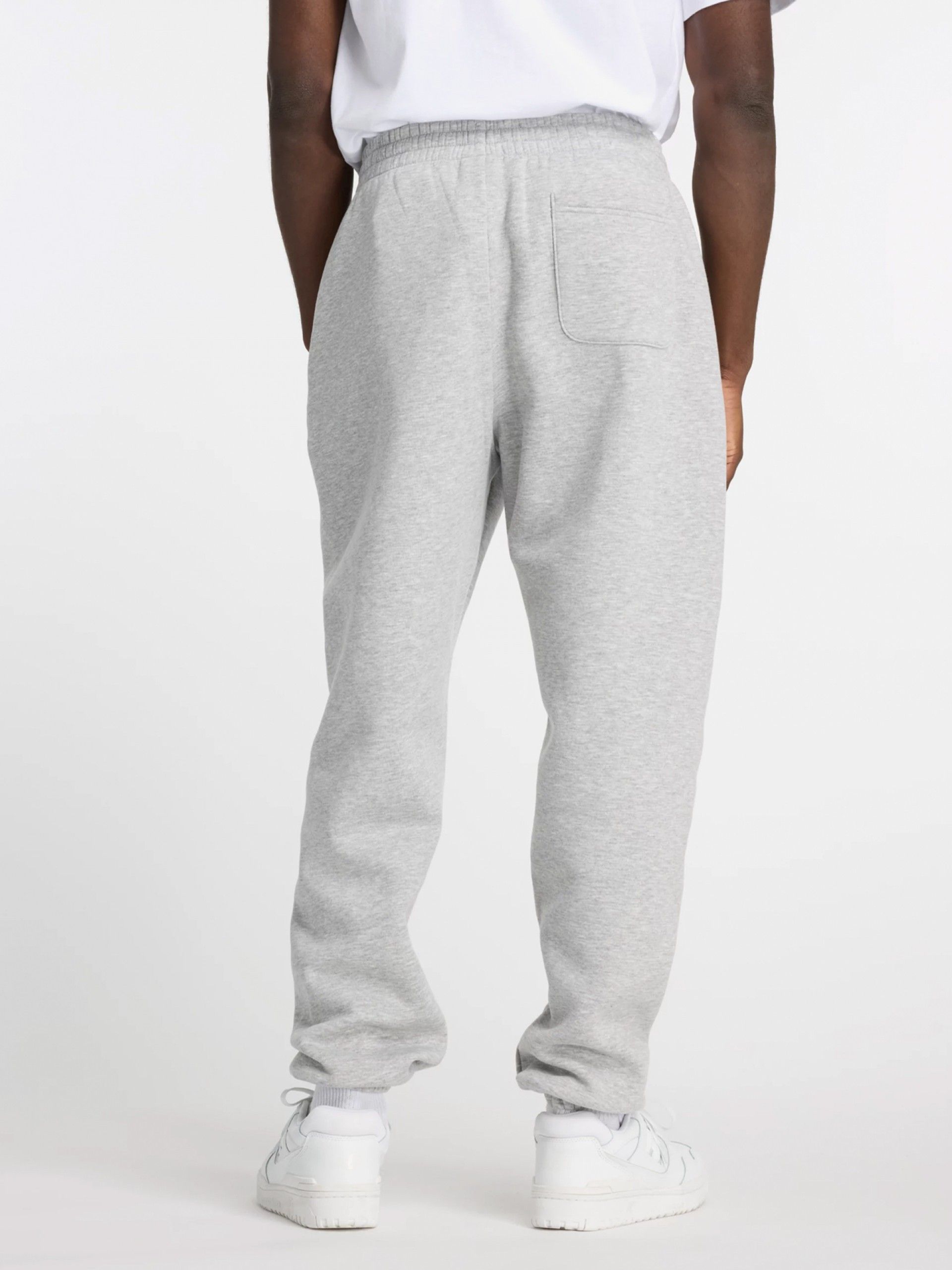 Pantalones New Balance Sport Essentials Fleece Jogger Grises