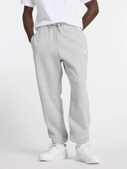 Pantalones New Balance Sport Essentials Fleece Jogger Grises
